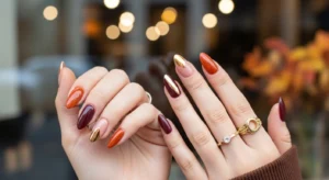 Flat lay of hands showing Stunning Fall Nail Art Ideas 2025