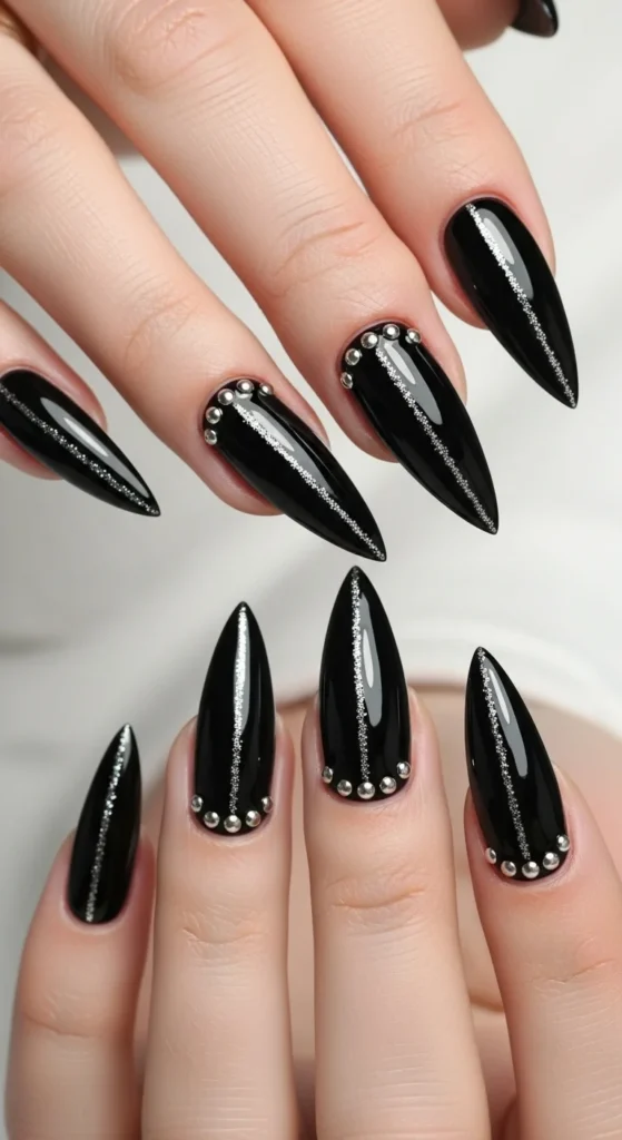 The Ultimate Nail Shape Guide: Choose & Master Your Look 8 Runway-inspired close-up of stiletto nails painted in a metallic chrome. Background: edgy urban setting, reflective surfaces.