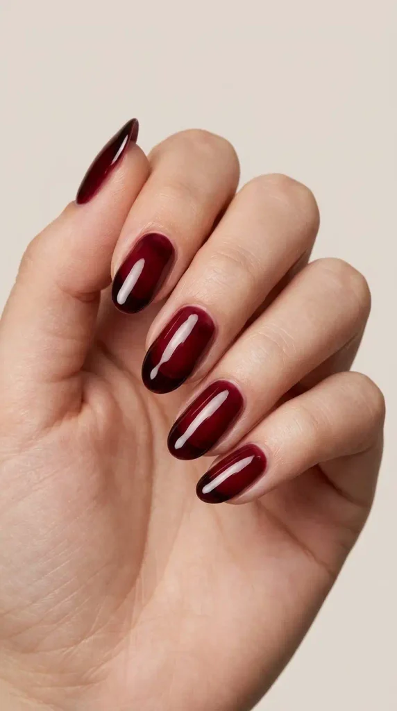 September Nails Inspiration: 13 Must-Try Manis That Scream Summer’s Final Glow 11 Black cherry jelly nails with glossy deep garnet-red finish