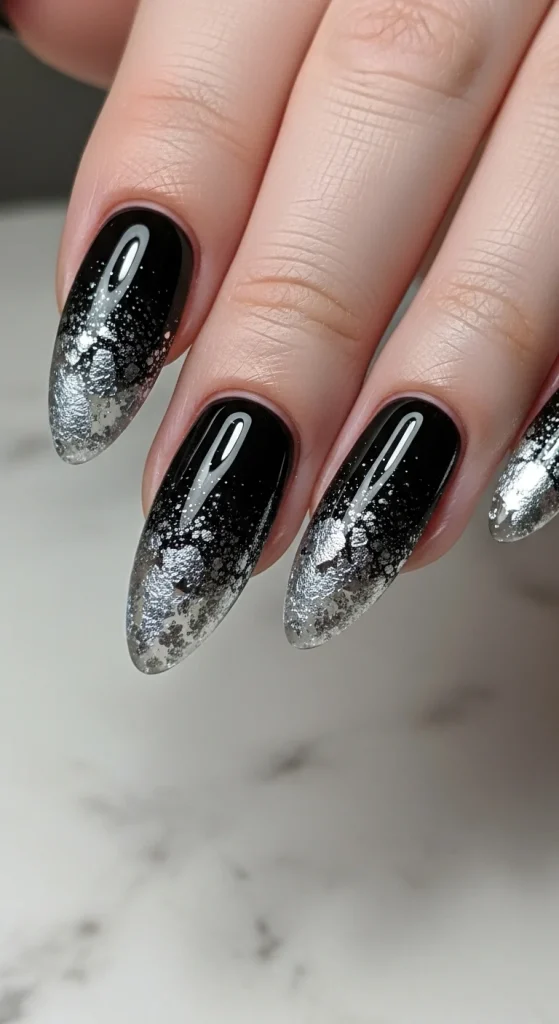 Black Fall Nails 2026: 19 Trendy Designs You’ll Love 15 Black jelly nails with silver foil flakes.