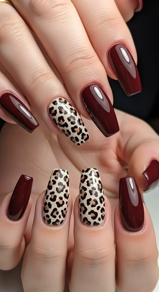  Burgundy cheetah print nails styled for Fall 2025 parties.