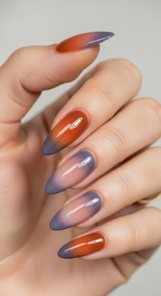 20 Chic September Nail Designs for 2026 That Capture Fall’s First Glow 2 Burnt caramel and smoky lilac ombré almond nails.