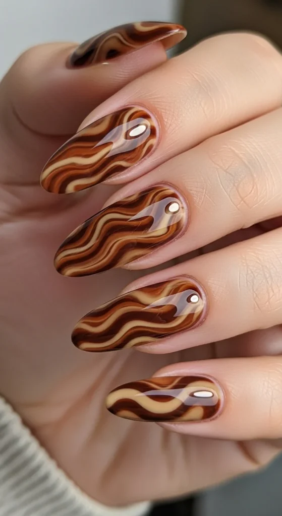 Chestnut and caramel marble nails with glossy finish