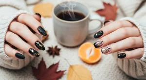 Black fall nails 2025 featuring almond and short shapes in matte, glossy, and artistic autumn designs.