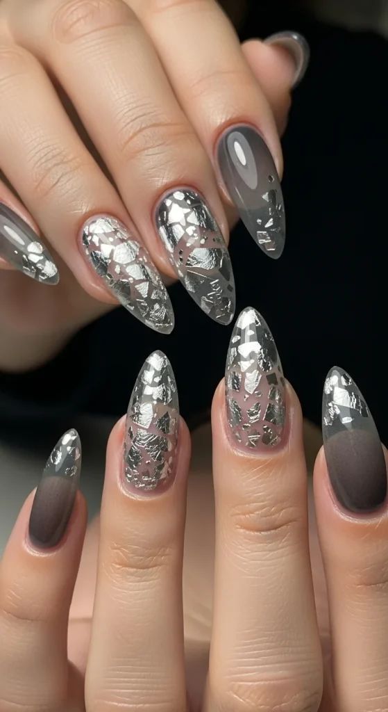 Transparent charcoal nails with reflective silver foil shards