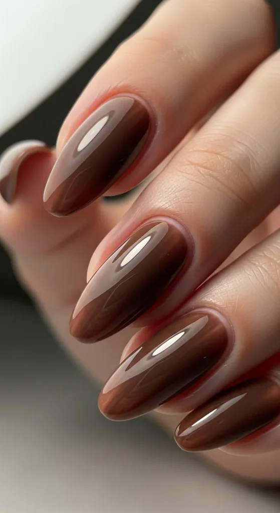 Warm Fall Nail Designs 2026: Earth Tone Manicure Ideas You’ll Love 3 Glossy mocha brown full-coverage nails