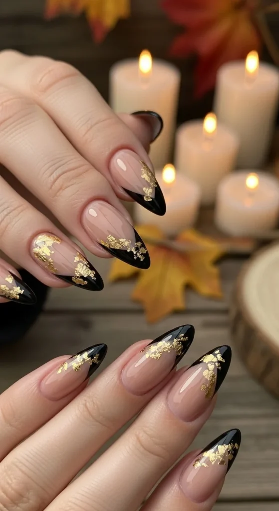 Black Fall Nails 2026: 19 Trendy Designs You’ll Love 7 Almond nails with nude base, glossy black tips, and delicate gold foil accents.