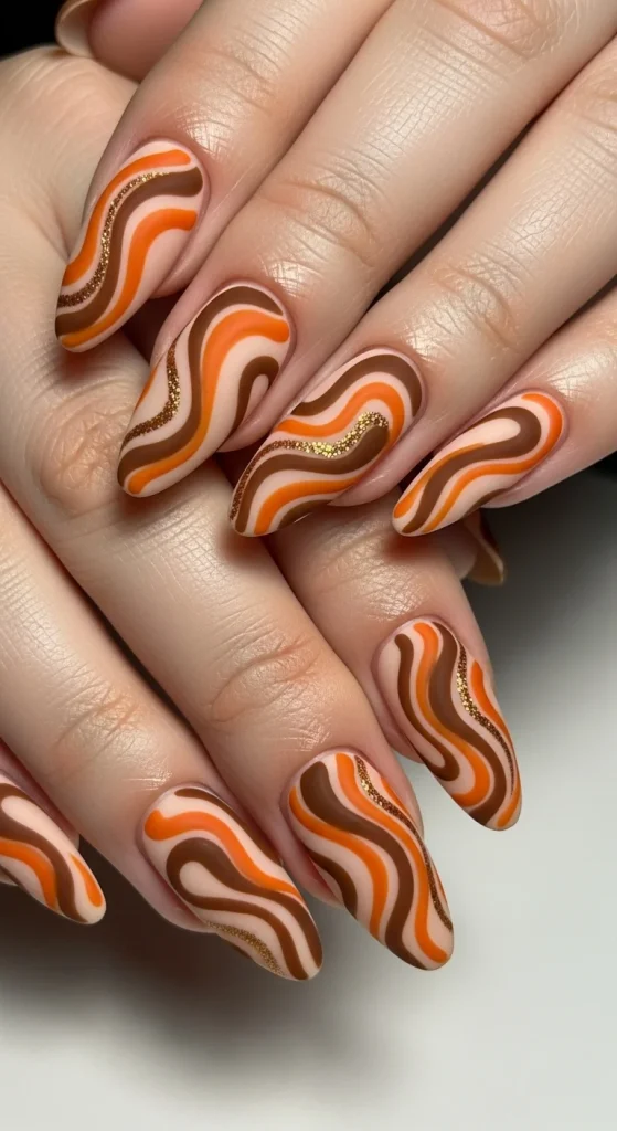 Abstract swirls in pumpkin orange and cinnamon brown on beige matte base