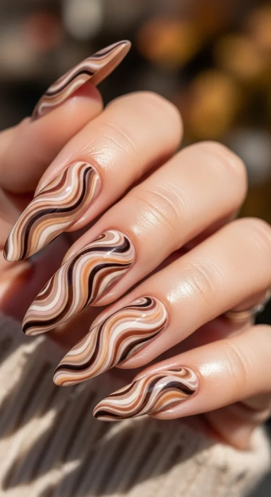 20 Chic September Nail Designs for 2026 That Capture Fall’s First Glow 21 Sepia marble nails in brown and beige tones.