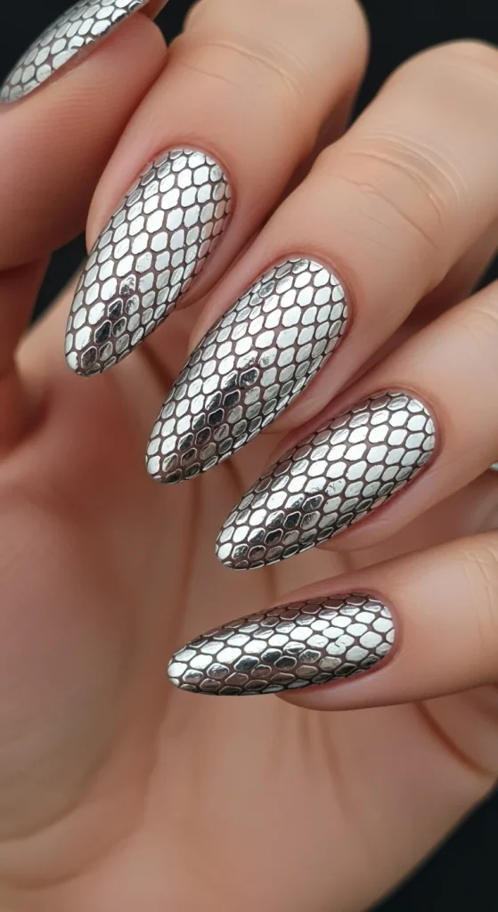 Chrome snakeskin nails with metallic finish for fall 2025.