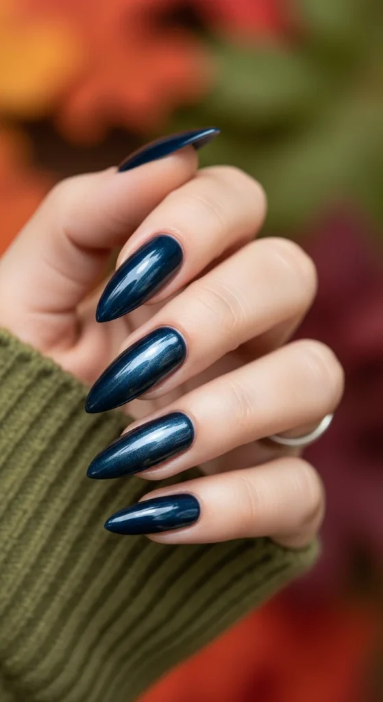 Stiletto nails in stormy navy chrome.