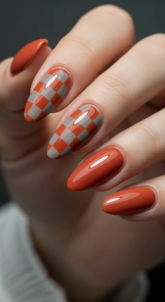 Taupe and terracotta checkerboard gel nails for a cozy fall vibe.