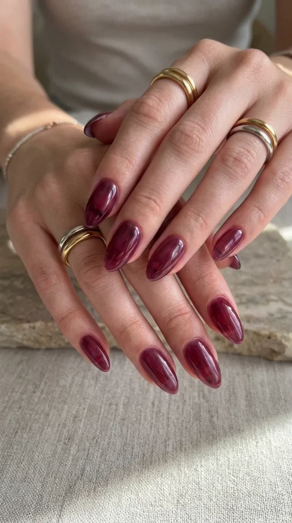 15 Red Nail Designs 2026: Cherry, Dark & Trendy Ideas You’ll Love 9 black cherry jelly nails glossy sheer finish dark red nails trend 2026