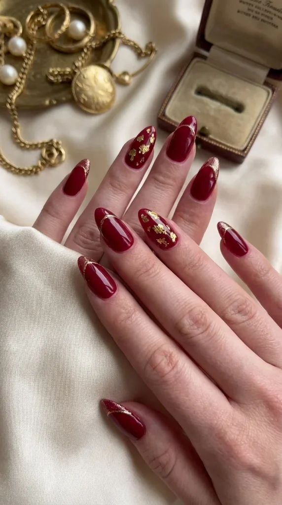15 Red Nail Designs 2026: Cherry, Dark & Trendy Ideas You’ll Love 13 cherry red nails with gold accents glitter foil luxury red nail design