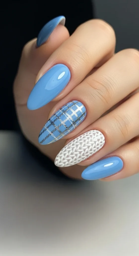 Plaid Nails with Cozy Sweater Texture: Holiday Nail Designs 2025 6 Frost-blue nails with silver plaid accent and white knit texture nail.