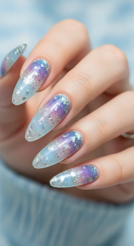 Translucent frozen glass nails with frosted shimmer and iridescent flakes.