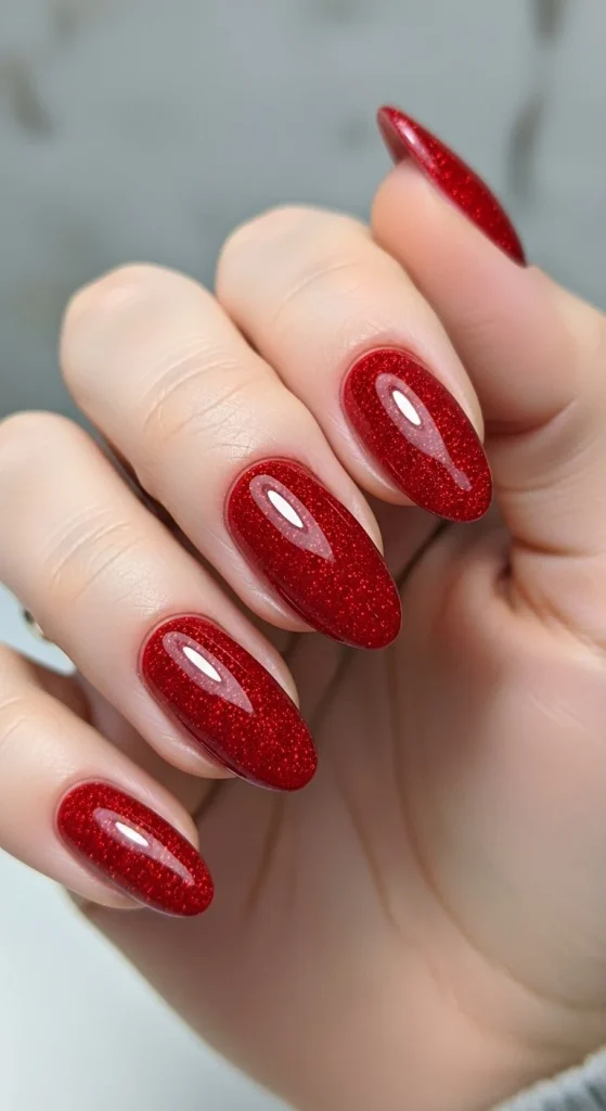 red glitter gel nails with glossy finish.