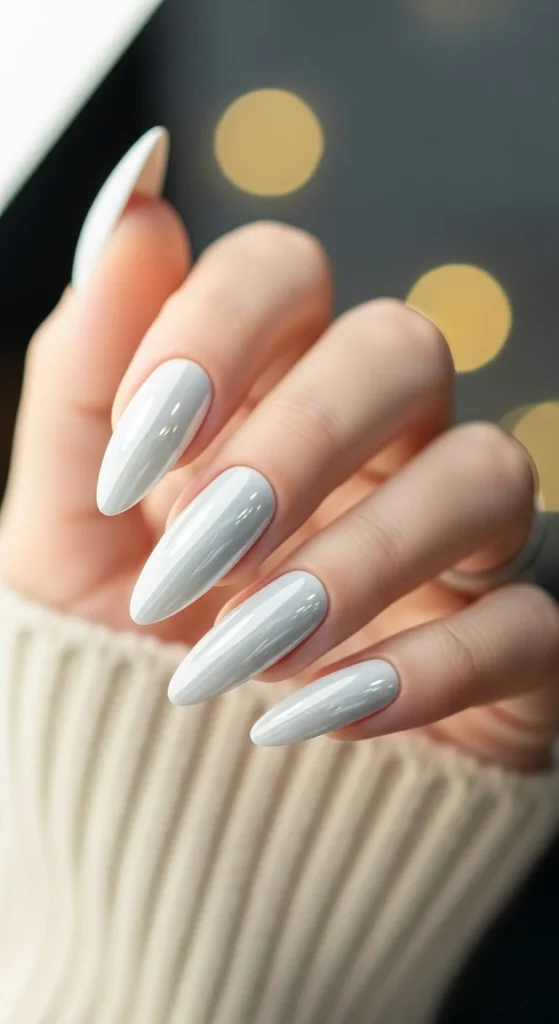 White chrome nails with a glossy mirror finish, perfect for winter 2025.