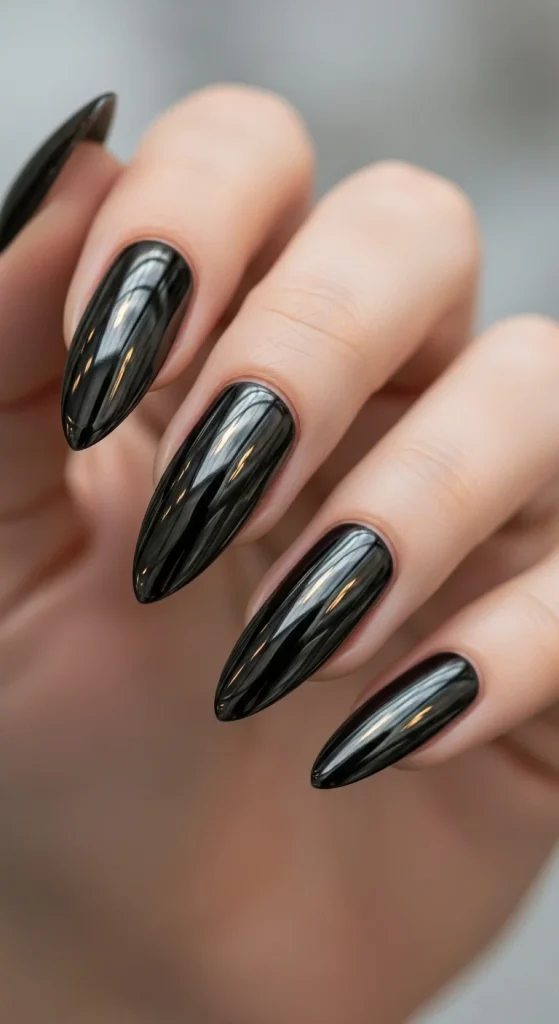 Black chrome New Year’s Eve nails with mirror finish.
