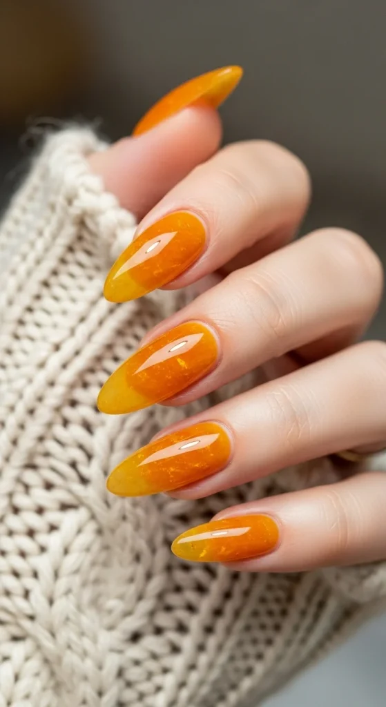 Velvet Chrome & Jelly Nails 2025–26: 30 Textured Holiday Nail Designs That Redefine Glamour 28 Amber jelly nails for cozy fall looks.