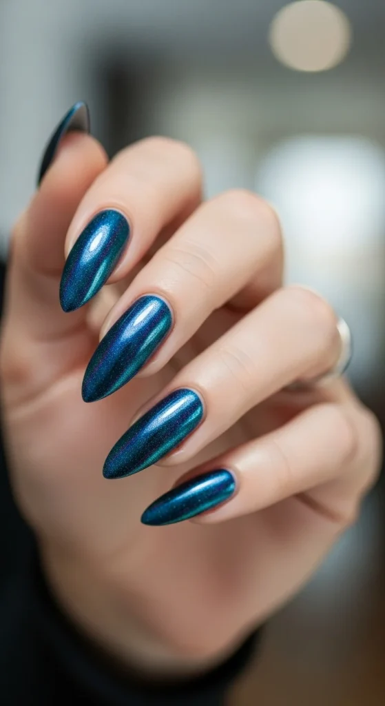 Midnight blue holographic nails for New Year’s Eve 2026.