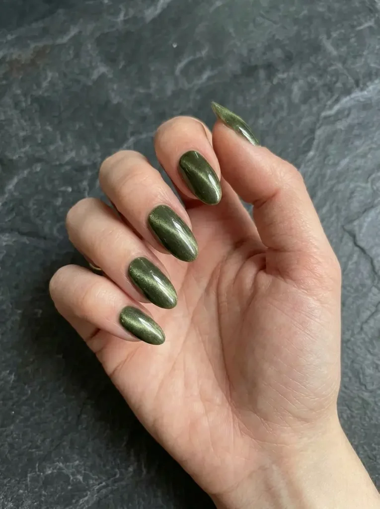 20 Chic September Nail Designs for 2026 That Capture Fall’s First Glow 18 Glossy moss green velvet nails with a soft magnetic cat-eye finish