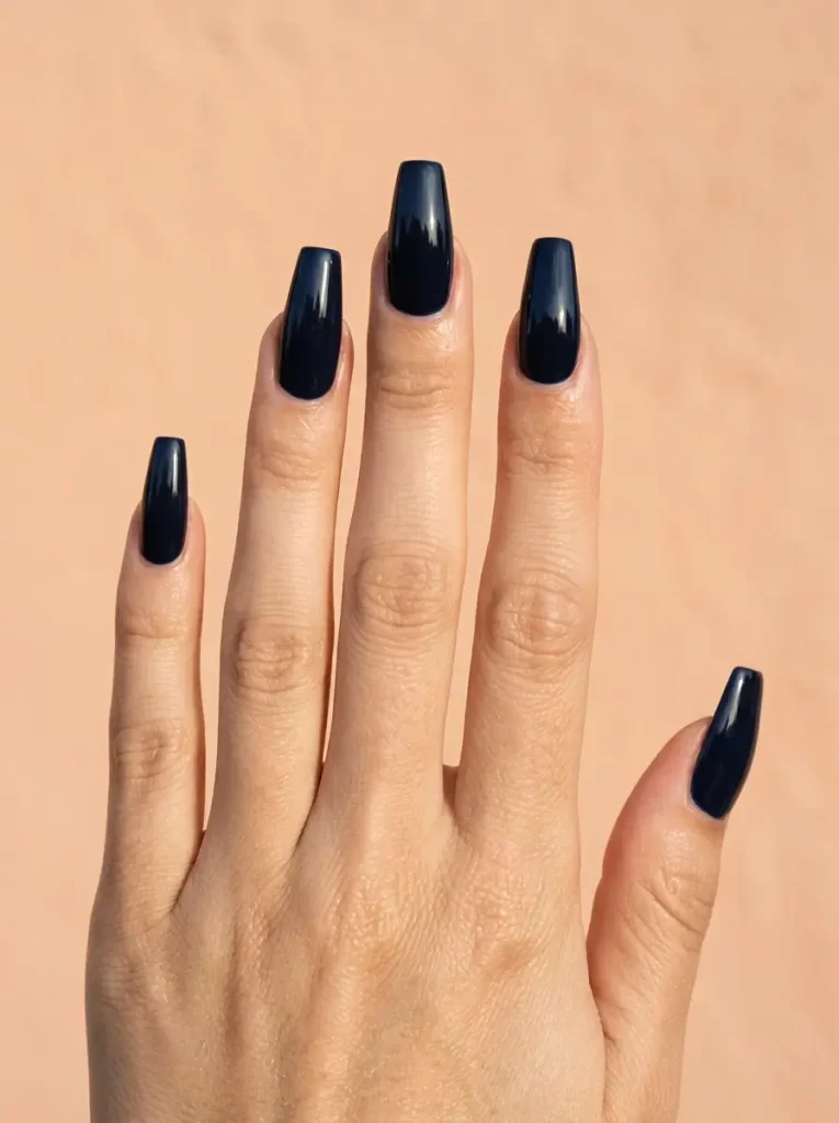 18 Fall Nail Colors for 2026, From Taupe to Navy 16 Navy blue glossy long coffin nails, on a light skin tone